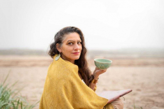 Mimmi Demetri von Pezold drinks tea upon a East Lothian beach Mimmi Demetri von Pezold drinks tea upon a East Lothian beach