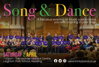 Background image shows Trinity Concert Band on stage at the Reading University Great Hall. Text over the image provides details of the Song & Dance concert. Background image shows Trinity Concert Band on stage at the Reading University Great Hall. Text over the image provides details of the Song & Dance concert.