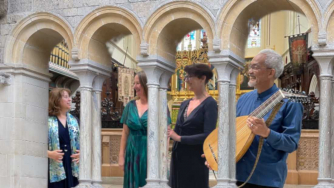 Jane, Alice, Carmel and Din seen through cloister columns Jane, Alice, Carmel and Din seen through cloister columns