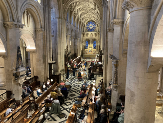 Chamber musicians perform in a Gothic cathedral