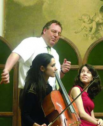 John Thwaites coaching young musicians