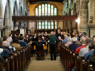 Interior St Andrew's Kildwick with choir & consort