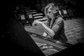 Cordelia Williams playing the piano at Turner Sims Cordelia Williams playing the piano at Turner Sims