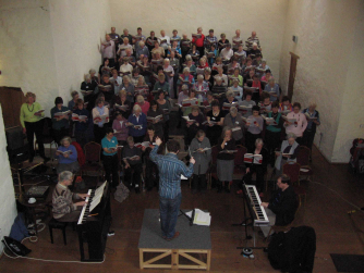 Singers in Dunster Tithe Barn Singers in Dunster Tithe Barn