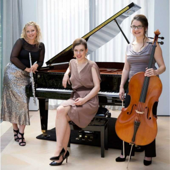 Marsyas Trio group photo positioned around a piano.