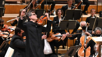 Roman Simovic performing on his violin.