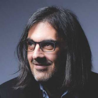 Photo of violinist Leonidas Kakavos. Photo of violinist Leonidas Kakavos.