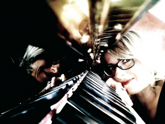 Maggie S. Lorelli and Piano keyboard
