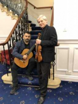 Adam Khan – classical guitar. Michael Bochmann – Violin